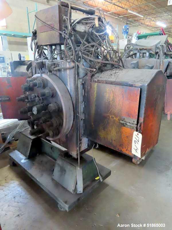 Used MGB Model SC12 Slide Plate Screen Changer. (2) Nominal 12" diameter breaker plates. Unit is mounted on a stand with casters supplying approximately a  42" discharge height. Package includes a 10...