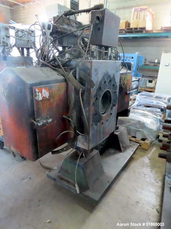 Used MGB Model SC12 Slide Plate Screen Changer. (2) Nominal 12" diameter breaker plates. Unit is mounted on a stand with casters supplying approximately a  42" discharge height. Package includes a 10...