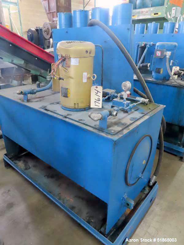 Used MGB Model SC12 Slide Plate Screen Changer. (2) Nominal 12" diameter breaker plates. Unit is mounted on a stand with casters supplying approximately a  42" discharge height. Package includes a 10...