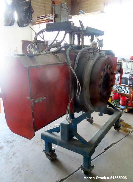 Used- MGB Model SC12 Slide Plate Screen Changer. (2) Nominal 12" diameter breaker plates. Unit is mounted on a stand with ca...