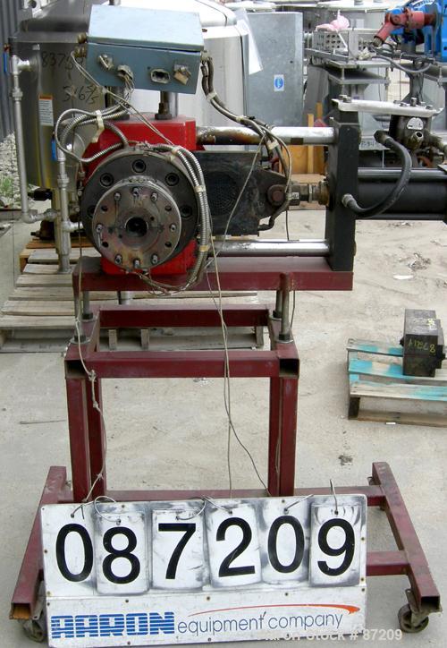 USED: MGB 4.5" hydraulic screen changer. No power pack. Mounted on a frame.