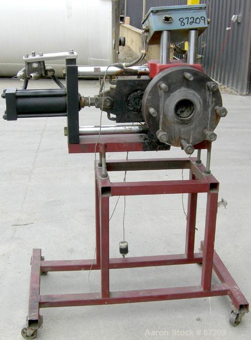 USED: MGB 4.5" hydraulic screen changer. No power pack. Mounted on a frame.