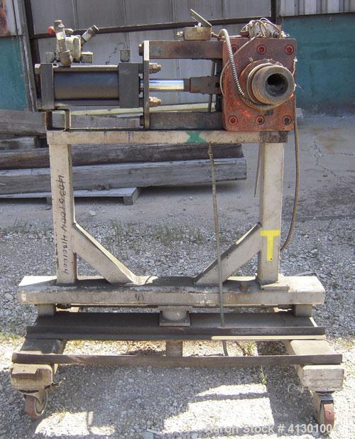 Used Approximate 3" Hydraulic Screen Changer.  Mounted on a carbon steel frame with casters.  Requires a screen holder and power pack.