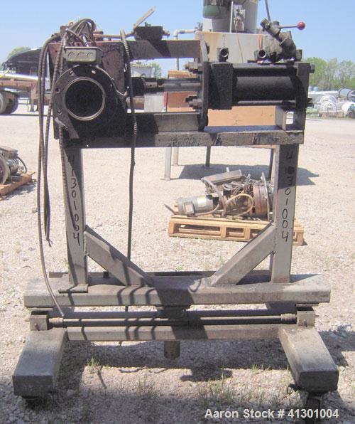 Used Approximate 3" Hydraulic Screen Changer.  Mounted on a carbon steel frame with casters.  Requires a screen holder and power pack.