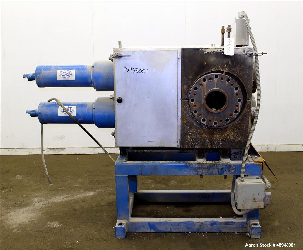 Used PSI Polymer Systems Inc. Continuous Screen Changer, Model CSC-230. Consists of (2) 9" diameter breaker plates with filter cavities. Extruder output 2,250 to 6,000 pounds per hour, 64.53 filter a...