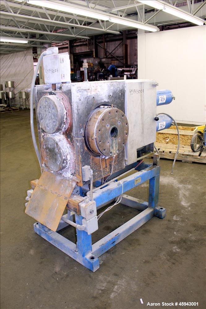 Used PSI Polymer Systems Inc. Continuous Screen Changer, Model CSC-230. Consists of (2) 9" diameter breaker plates with filter cavities. Extruder output 2,250 to 6,000 pounds per hour, 64.53 filter a...