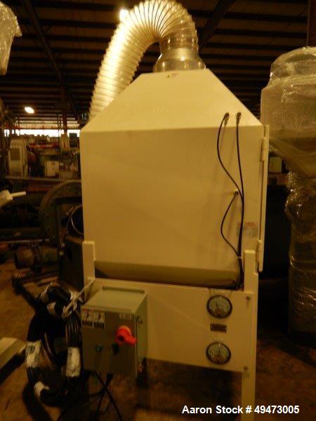 Used ENERCON Film Treater, Approximate 92'' Wide. Includes Operator Controls. Previously used on approximate 30 mil Solar Film. New in 2012.