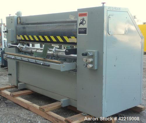 Used Contech 60" Wide CompuSheeter, Model CS-60. (2) Pneumatically adjustable rubber pinch rolls. Includes a stacker, a custom integrated winder, and a 7.5 hp hydraulic motor and control panel. 1424 ...