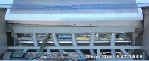 Used Contech 60" Wide CompuSheeter, Model CS-60. (2) Pneumatically adjustable rubber pinch rolls. Includes a stacker, a custom integrated winder, and a 7.5 hp hydraulic motor and control panel. 1424 ...