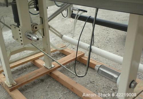 Used Contech 60" Wide CompuSheeter, Model CS-60. (2) Pneumatically adjustable rubber pinch rolls. Includes a stacker, a custom integrated winder, and a 7.5 hp hydraulic motor and control panel. 1424 ...