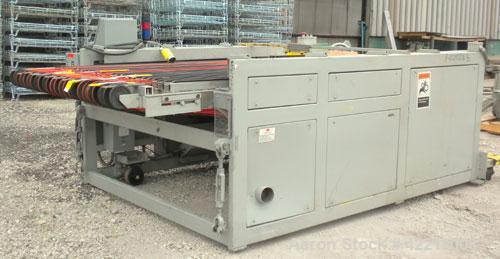Used Contech 60" Wide CompuSheeter, Model CS-60. (2) Pneumatically adjustable rubber pinch rolls. Includes a stacker, a custom integrated winder, and a 7.5 hp hydraulic motor and control panel. 1424 ...