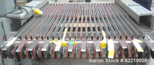 Used Contech 60" Wide CompuSheeter, Model CS-60. (2) Pneumatically adjustable rubber pinch rolls. Includes a stacker, a custom integrated winder, and a 7.5 hp hydraulic motor and control panel. 1424 ...