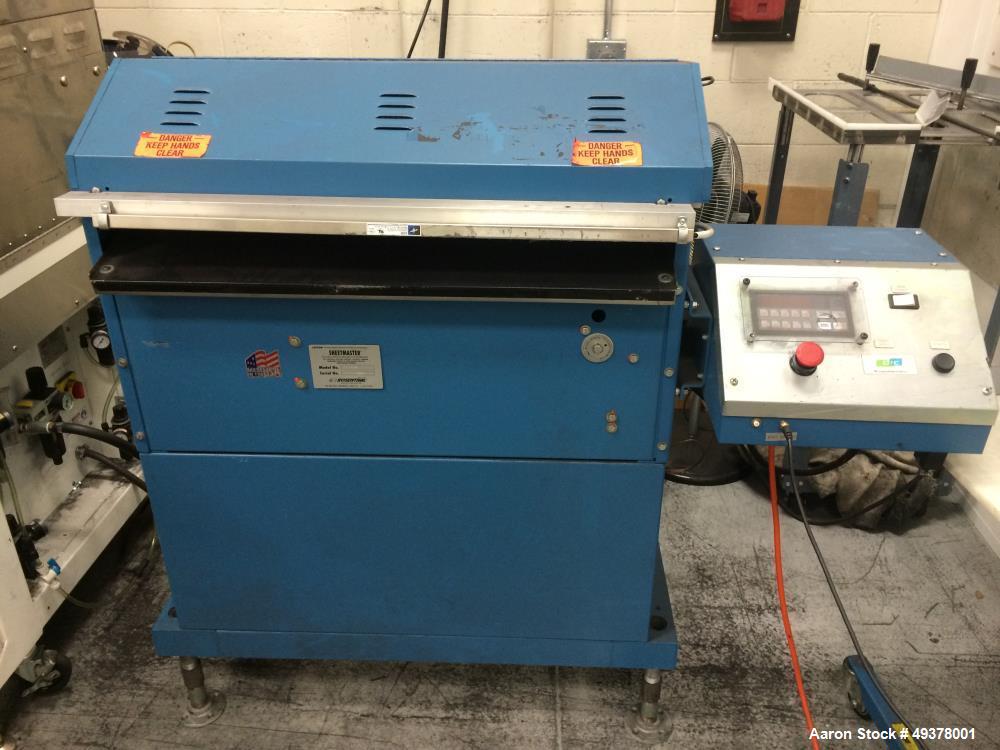 Used Rosenthal Manufacturing Sheetmaster Sheeter, Model SM-30. Approximate 30" wide capacity. Up to 75 sheets per minute, up to 1/16" cut length accuracy. Equipped with Controller 58851-419, Foot swi...