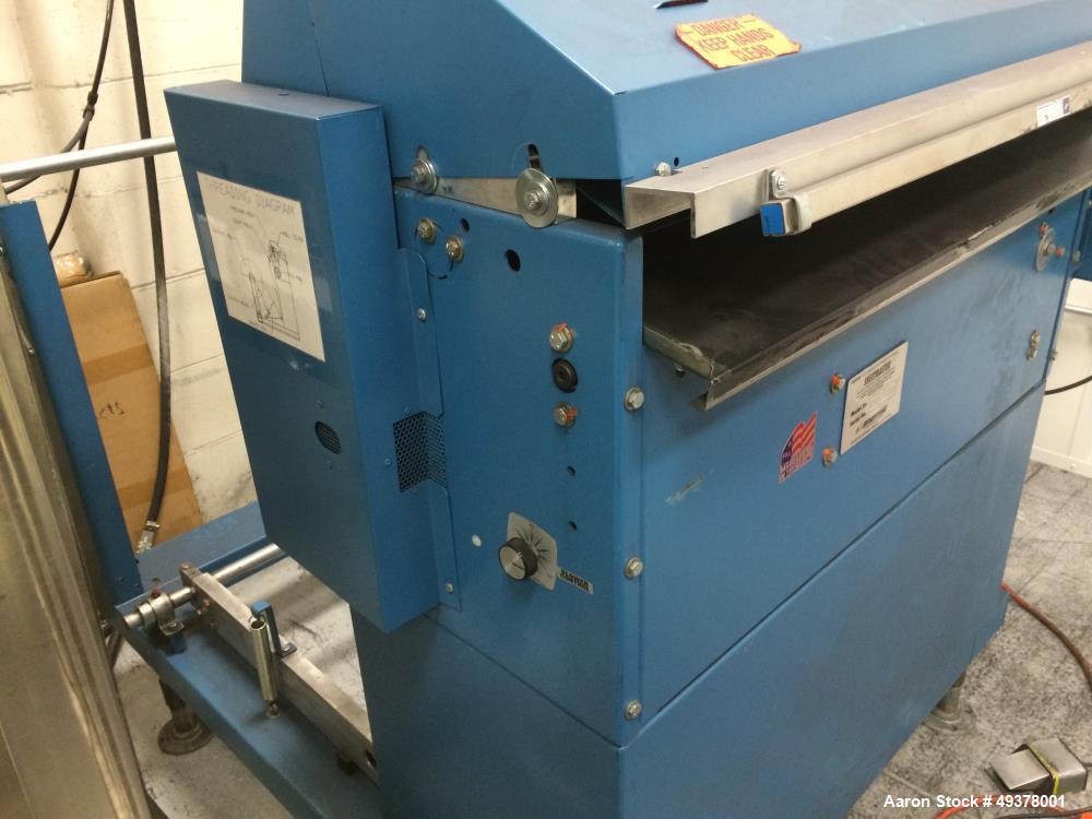 Used Rosenthal Manufacturing Sheetmaster Sheeter, Model SM-30. Approximate 30" wide capacity. Up to 75 sheets per minute, up to 1/16" cut length accuracy. Equipped with Controller 58851-419, Foot swi...