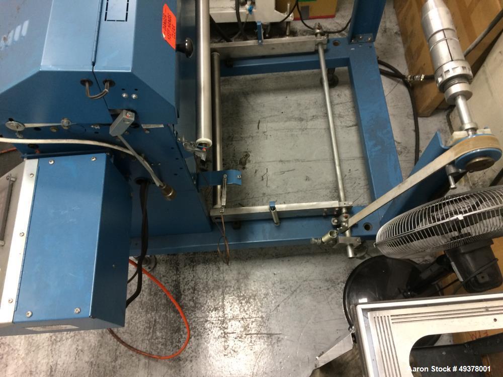 Used Rosenthal Manufacturing Sheetmaster Sheeter, Model SM-30. Approximate 30" wide capacity. Up to 75 sheets per minute, up to 1/16" cut length accuracy. Equipped with Controller 58851-419, Foot swi...