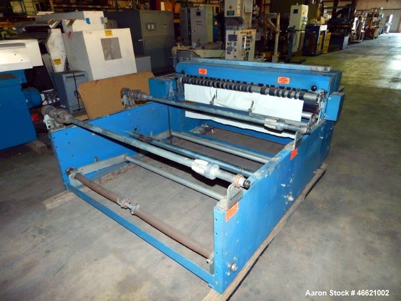 Used Rosenthal 60" Sheeter, Model WAS5-HUBUBZTEA-2. (2) 0.5 hp Motors, (2) 30" O.D. unwinds, (2) dancer rolls, idler roll, tension assembly, (1) pressure roll, (1) auxiliary pressure roll. Set up for...