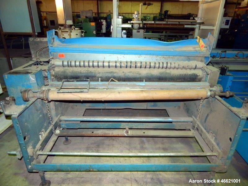 Used Rosenthal 60" Sheeter. (1) Unwind, idler roll, dancer roll, tension assembly, pressure roll. Set up for razor slitting with (2) blades.
