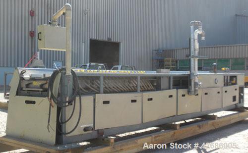 Used Crown Vacuum Calibrating Table, Model CMZDY. Stainless steel pan 24'' wide x 231'' long x approximately 3-3/4'' deep. 2. The dies are connected with aluminum alloy “T” guiding rails and bolts. I...