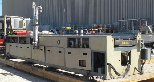 Used Crown Vacuum Calibrating Table, Model CMZDY. Stainless steel pan 24'' wide x 231'' long x approximately 3-3/4'' deep. 2. The dies are connected with aluminum alloy “T” guiding rails and bolts. I...