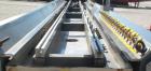 Used Crown Vacuum Calibrating Table, Model CMZDY. Stainless steel pan 24'' wide x 231'' long x approximately 3-3/4'' deep. 2. The dies are connected with aluminum alloy “T” guiding rails and bolts. I...