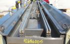 Used Crown Vacuum Calibrating Table, Model CMZDY. Stainless steel pan 24'' wide x 231'' long x approximately 3-3/4'' deep. 2. The dies are connected with aluminum alloy “T” guiding rails and bolts. I...