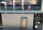 Used Crown Vacuum Calibrating Table, Model CMZDY. Stainless steel pan 24'' wide x 231'' long x approximately 3-3/4'' deep. 2. The dies are connected with aluminum alloy “T” guiding rails and bolts. I...