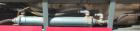 Used Crown Vacuum Calibrating Table, Model CMZDY. Stainless steel pan 24'' wide x 231'' long x approximately 3-3/4'' deep. 2. The dies are connected with aluminum alloy “T” guiding rails and bolts. I...
