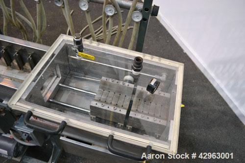 Used Al-Be Industries Vacuum Sizing Tank, Model C-7-216, 304 Stainless steel. Vacuum section 14’’ wide x 24’’ long x 7-1/2’’ deep with a plastic cover. Cooling section 8’’ wide x 216’’ long x 8’’ dee...