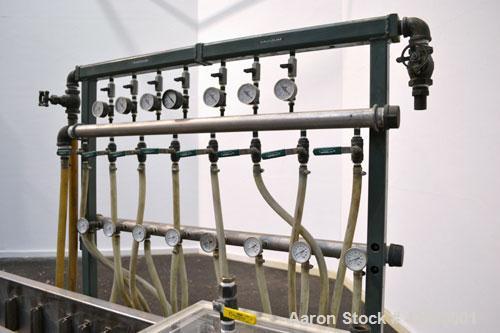 Used Al-Be Industries Vacuum Sizing Tank, Model C-7-216, 304 Stainless steel. Vacuum section 14’’ wide x 24’’ long x 7-1/2’’ deep with a plastic cover. Cooling section 8’’ wide x 216’’ long x 8’’ dee...