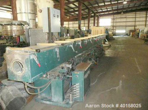 Used CDS Vacuum Sizing/Spray Cooling Tank, model 12-30SPLH, stainless steel. 12" X 12" cross section x 30' long. Includes pumps and plexiglass covers for each zone.