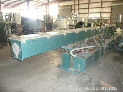 Used CDS Vacuum Sizing/Spray Cooling Tank, model 12-30SPLH, stainless steel. 12" X 12" cross section x 30' long. Includes pumps and plexiglass covers for each zone.