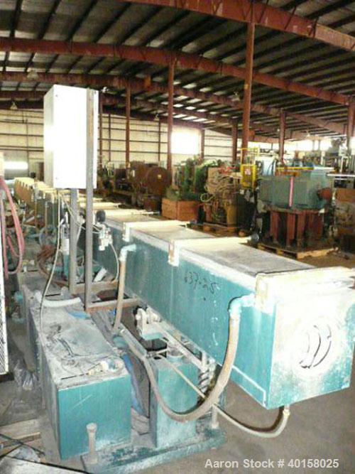 Used CDS Vacuum Sizing/Spray Cooling Tank, model 12-30SPLH, stainless steel. 12" X 12" cross section x 30' long. Includes pumps and plexiglass covers for each zone.