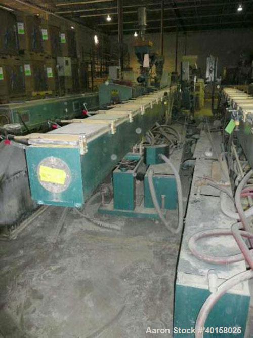 Used CDS Vacuum Sizing/Spray Cooling Tank, model 12-30SPLH, stainless steel. 12" X 12" cross section x 30' long. Includes pumps and plexiglass covers for each zone.