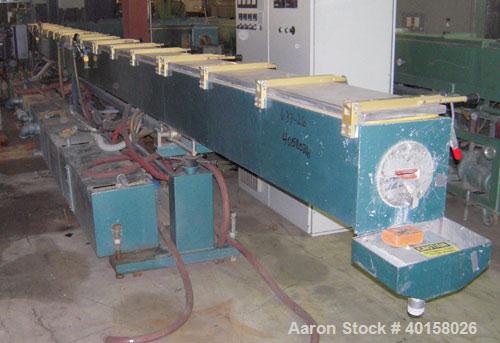 Used CDS Vacuum Sizing/Spray Cooling Tank, model CVS12-30SPRH, stainless steel. 12" X 12" cross section x 30' long. Includes pumps and plexiglass covers for each zone.