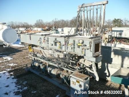 Used Metaplast Vacuum Sizing Tank, Model MVS2-10-4, approximately 10' long. Equipped with (2) pumps. Serial#895009.