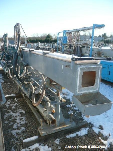 Used Metaplast Vacuum Sizing Tank, Model MVS2-10-4, approximately 10' long. Equipped with (2) pumps. Serial#895009.