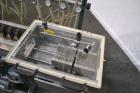 Used Al-Be Industries Vacuum Sizing Tank, Model C-7-216, 304 Stainless steel. Vacuum section 14’’ wide x 24’’ long x 7-1/2’’ deep with a plastic cover. Cooling section 8’’ wide x 216’’ long x 8’’ dee...