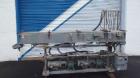 Used Metaplast Vacuum Sizing Tank, Model MVS2-10-4, approximately 10' long. Equipped with (2) pumps. Serial#895009.