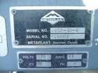 Used Metaplast Vacuum Sizing Tank, Model MVS2-10-4, approximately 10' long. Equipped with (2) pumps. Serial#895009.