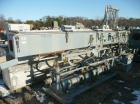 Used Metaplast Vacuum Sizing Tank, Model MVS2-10-4, approximately 10' long. Equipped with (2) pumps. Serial#895009.