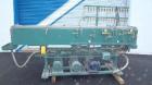 Used Metaplast Vacuum Sizing Tank, Model MVS. Approximately 14' long. Includes (3) pumps.