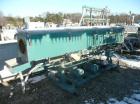 Used Metaplast Vacuum Sizing Tank, Model MVS. Approximately 14' long. Includes (3) pumps.