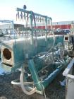 Used Metaplast Vacuum Sizing Tank, Model MVS. Approximately 14' long. Includes (3) pumps.
