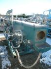Used Metaplast Vacuum Sizing Tank, Model MVS. Approximately 14' long. Includes (3) pumps.