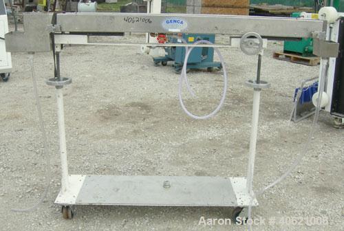 Used Genca Water Bath, stainless steel. 4" wide x 60" long x 3" deep. Mounted on a carbon steel base with casters.