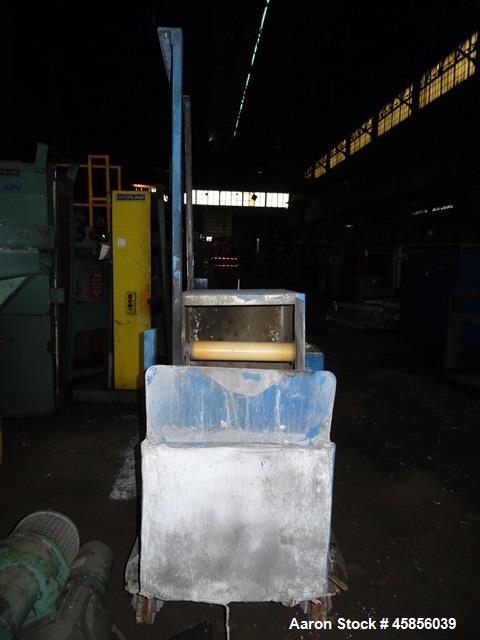 Used Water Bath, Stainless Steel. Approximate 20" wide x 20" deep x 20" long trough with (2) circulation pumps and (1) heat exchanger.