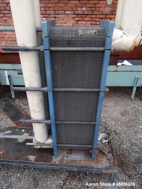 Used Water Bath, Stainless Steel. Approximate 20" wide x 20" deep x 20" long trough with (2) circulation pumps and (1) heat exchanger.