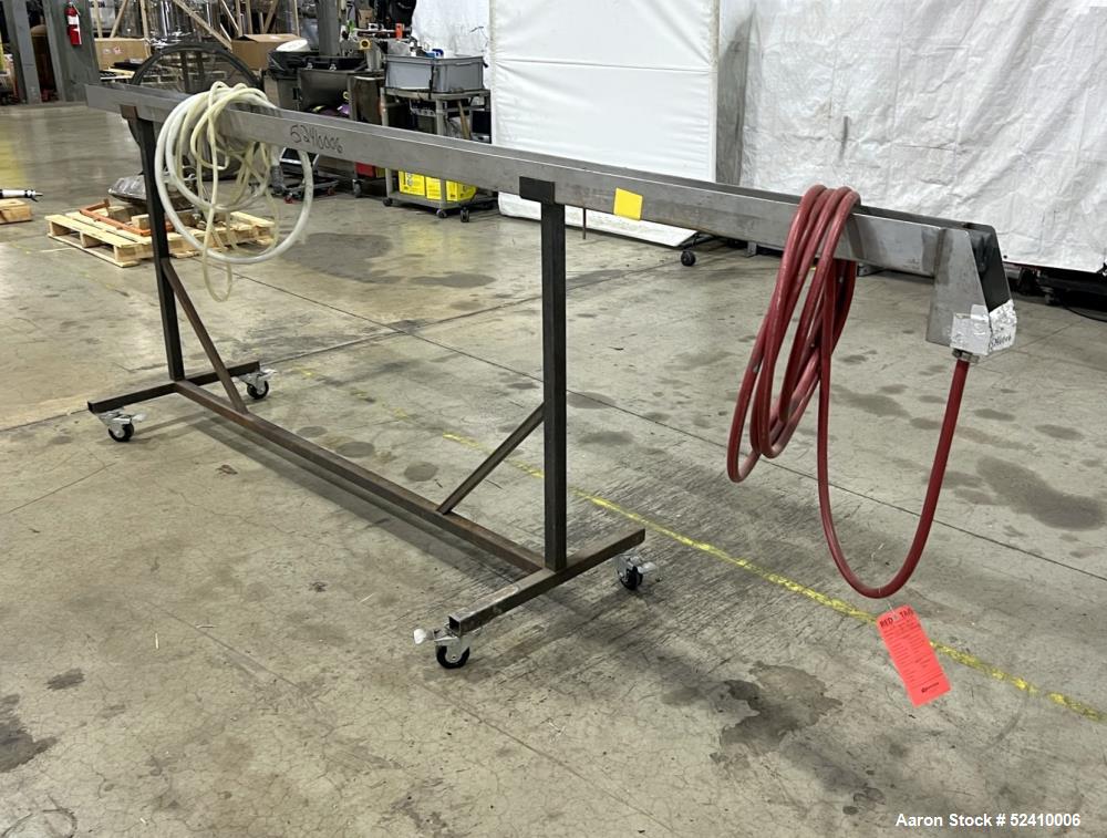 Used Water Bath, 304 Stainless Steel. 4" wide x 120" long x 3" deep trough. 1/2" outlet. Mounted on carbon steel frame with casters.