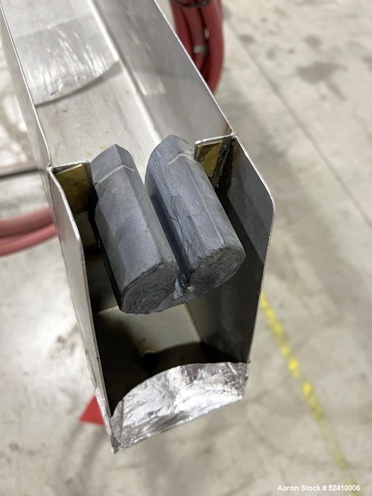 Used Water Bath, 304 Stainless Steel. 4" wide x 120" long x 3" deep trough. 1/2" outlet. Mounted on carbon steel frame with casters.