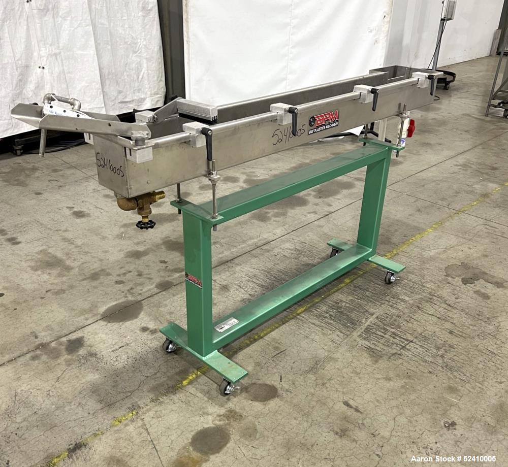 Used BPM Water Bath, Model WBX0606-6, 304 Stainless Steel. 6" wide x 72" long x 6" deep trough. 2" and 1-1/4" outlets fitted with 1" threaded piping. Includes air-knife. Mounted on carbon steel frame...